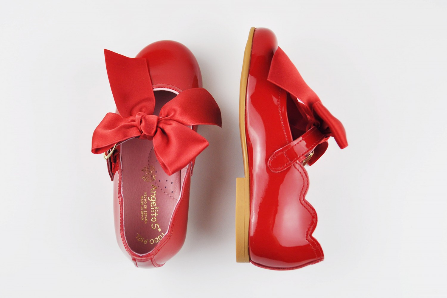 ANGELITOS MERCEDITA DE NIÑA CON LAZO ROJA