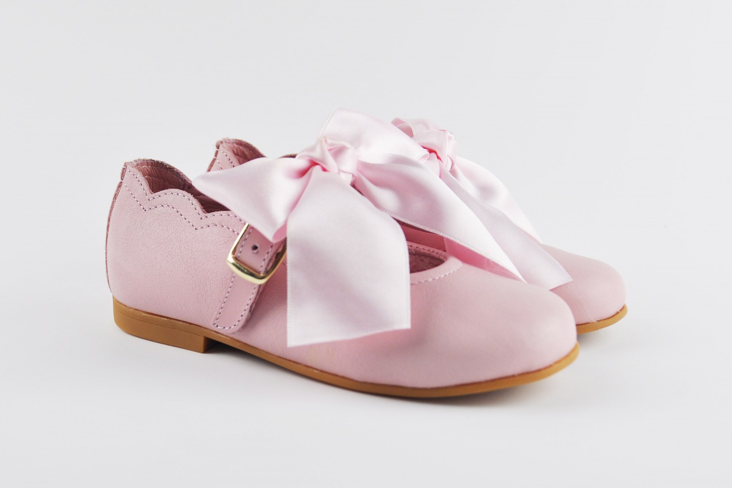 ANGELITOS MERCEDITA DE NIÑA CON HEBILLA Y LAZO ROSA